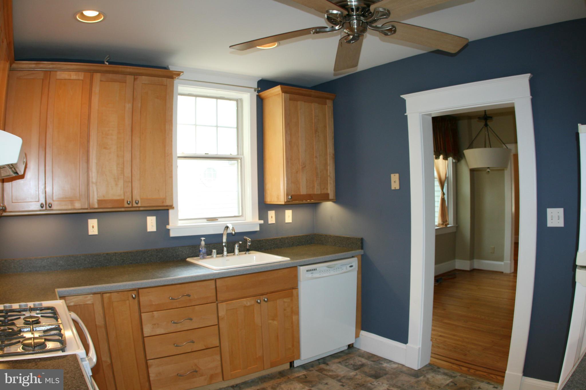 23 Edmondson Ridge Road Catonsville, MD 21228 - Photo 5 of 18 a kitchen with sink cabinets and window