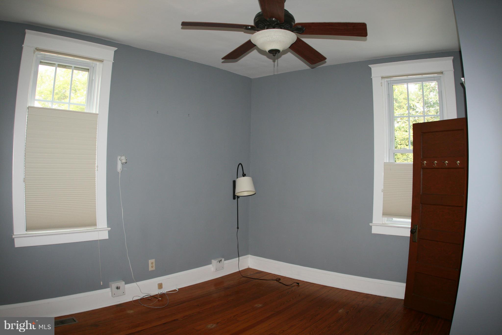 23 Edmondson Ridge Road Catonsville, MD 21228 - Photo 7 of 18 a view of empty room with wooden floor