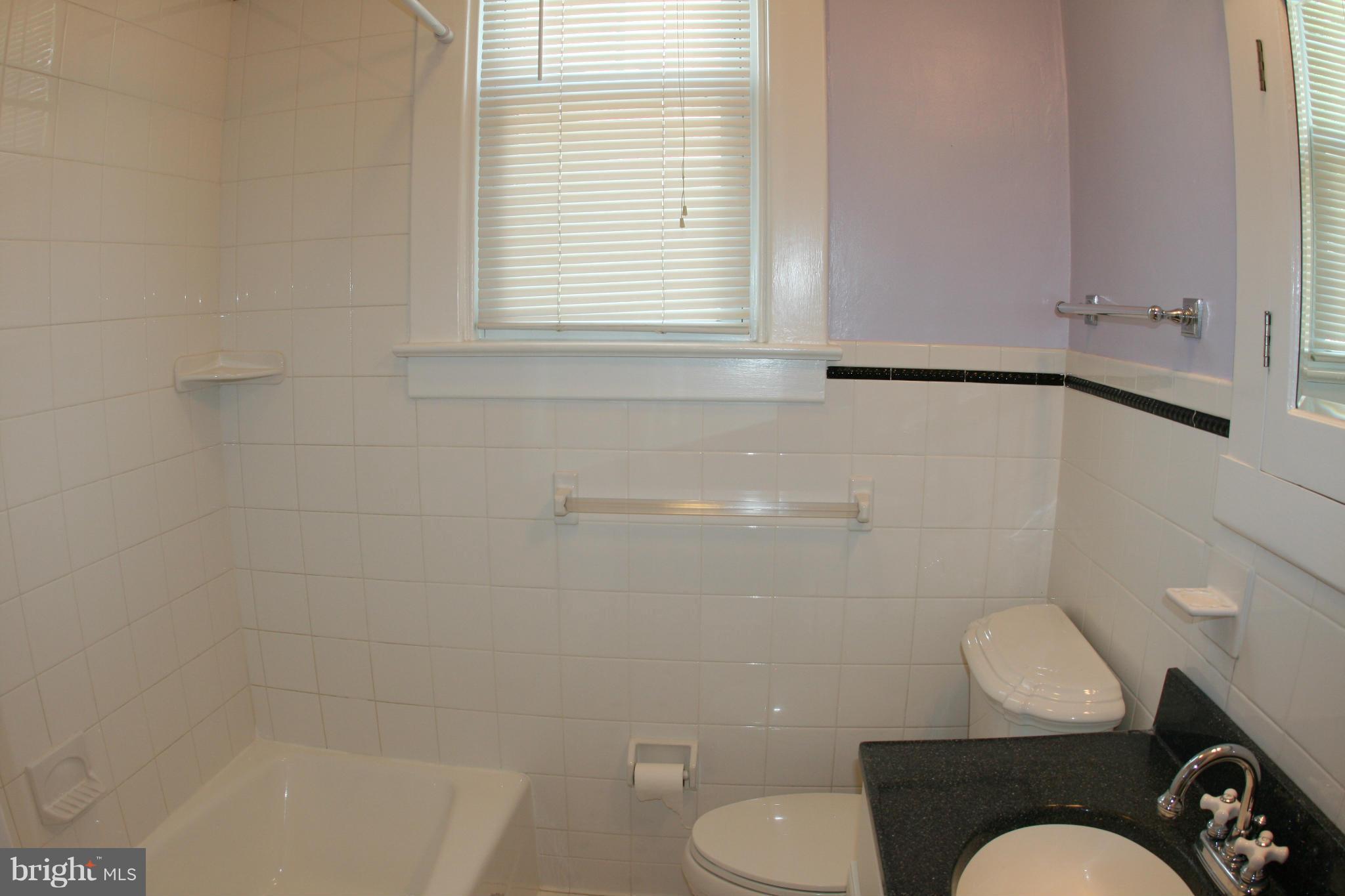 23 Edmondson Ridge Road Catonsville, MD 21228 - Photo 10 of 18 a bathroom with a toilet and a shower