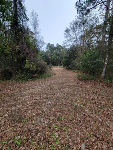 a kitchen with stainless steel appliances granite countertop a stove sink and cabinets