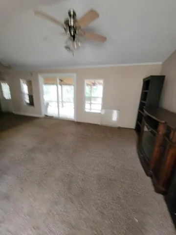 a bed room with a bed and window