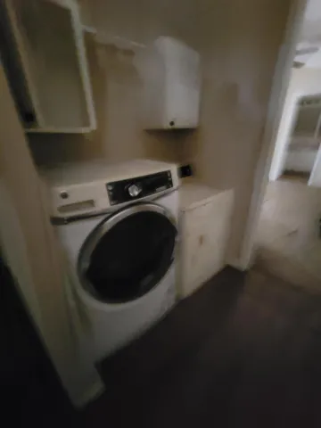 a view of a house and a yard