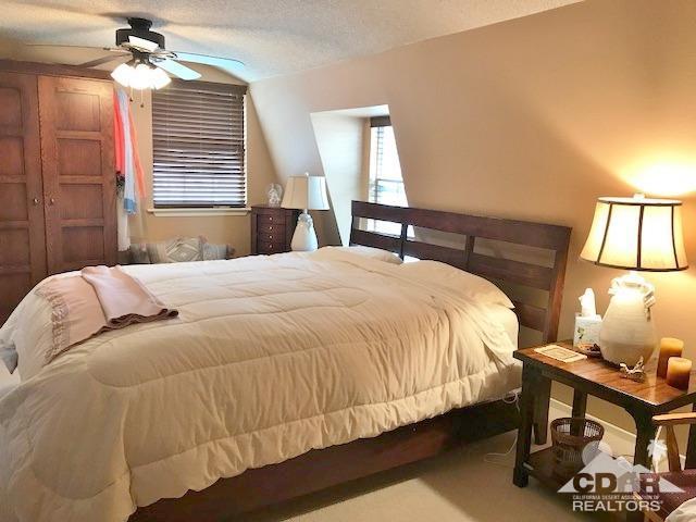 35280 Tool Box Spring Road Mountain Center, CA 92561 - Photo 15 of 29 a bedroom with a bed and window