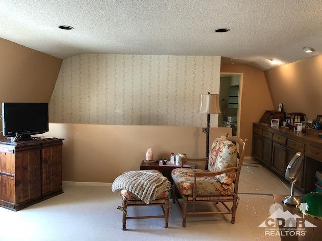 35280 Tool Box Spring Road Mountain Center, CA 92561 - Photo 21 of 29 a living room with furniture and a flat screen tv