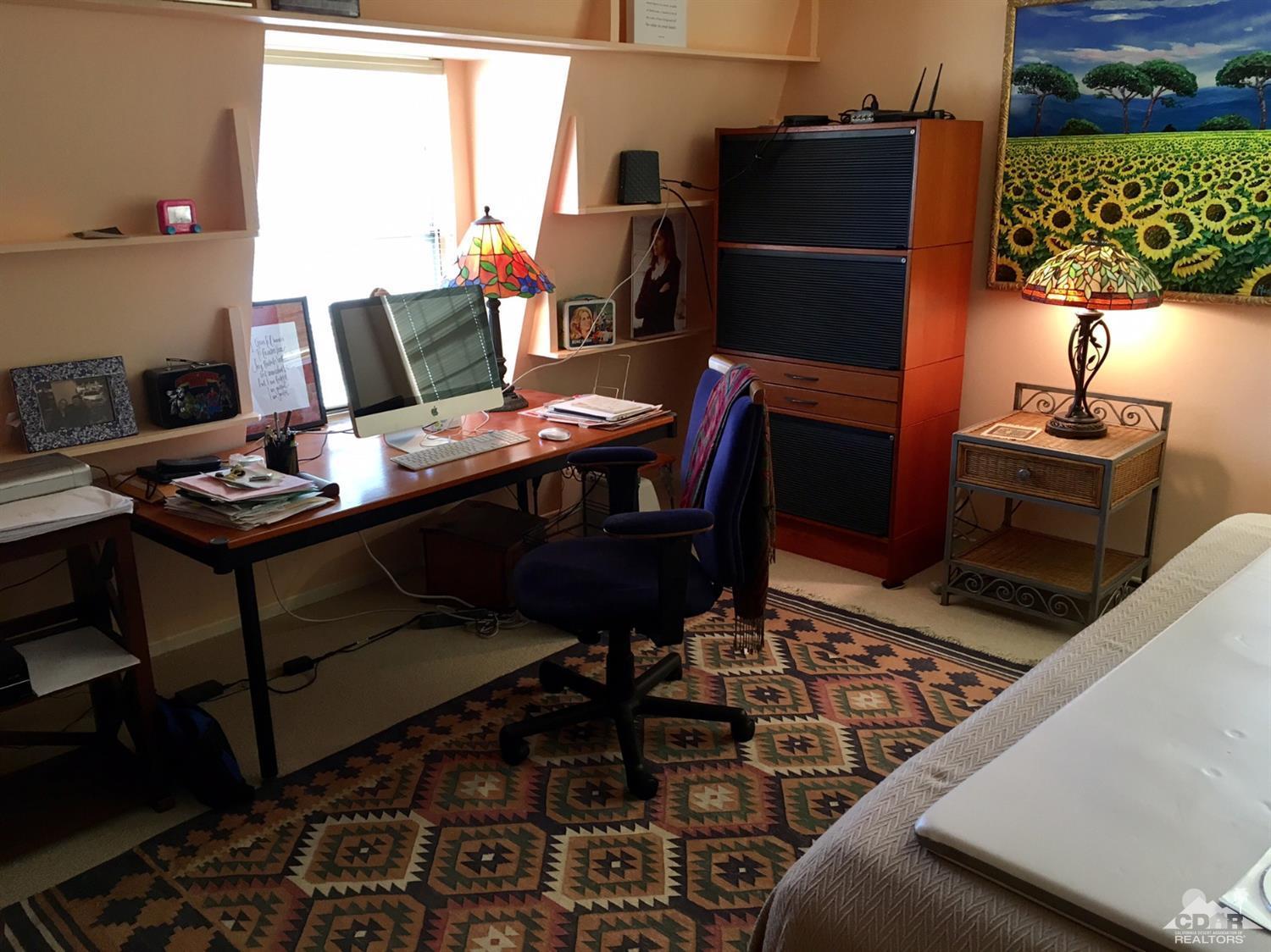 35280 Tool Box Spring Road Mountain Center, CA 92561 - Photo 25 of 29 a living room with a couch and a table