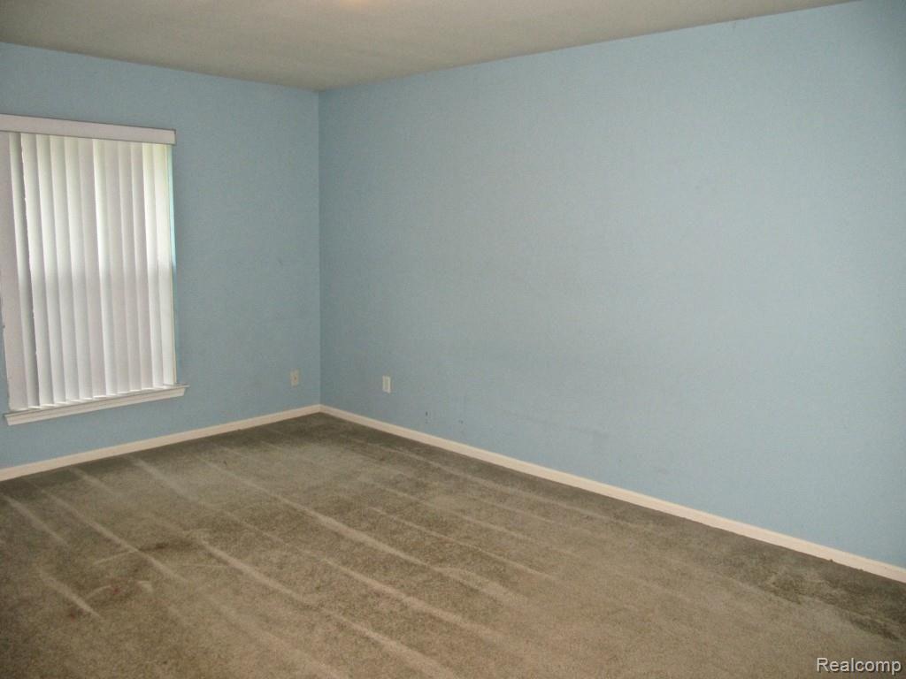 3397 Tremonte Circle, Unit 202 Rochester, MI 48306 - Photo 32 of 35 Private second Bedroom