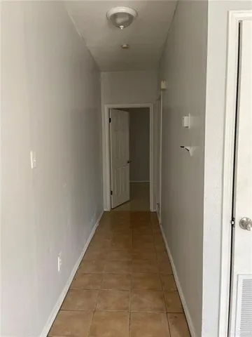 a view of a room with an empty space