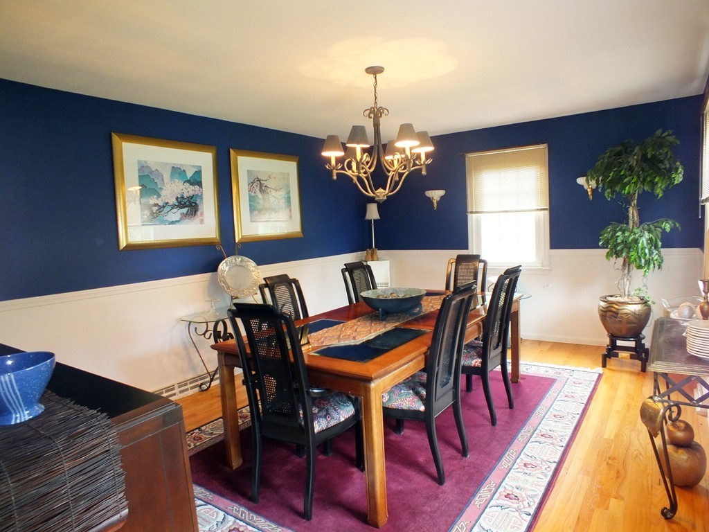 17 Orchard Road East Longmeadow, MA 01028 - Photo 13 of 30 a view of a dining room with furniture a chandelier and wooden floor
