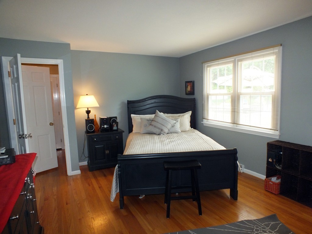 17 Orchard Road East Longmeadow, MA 01028 - Photo 14 of 30 a bedroom with a bed and wooden floor