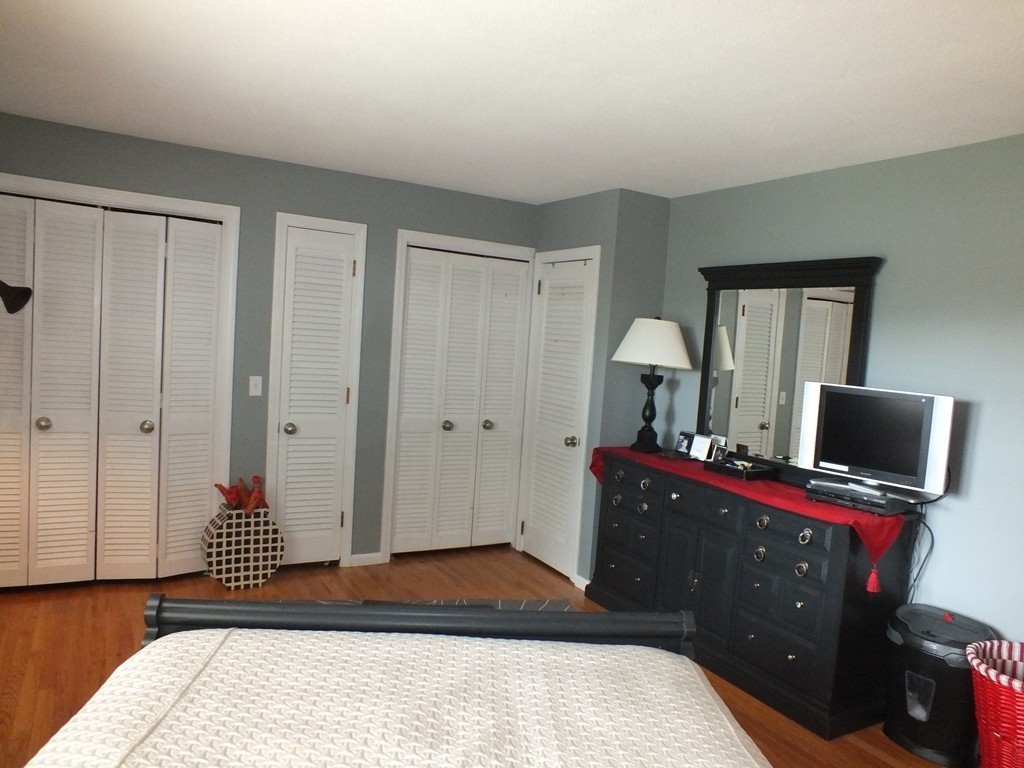 17 Orchard Road East Longmeadow, MA 01028 - Photo 15 of 30 a bedroom with a bed and flat screen tv