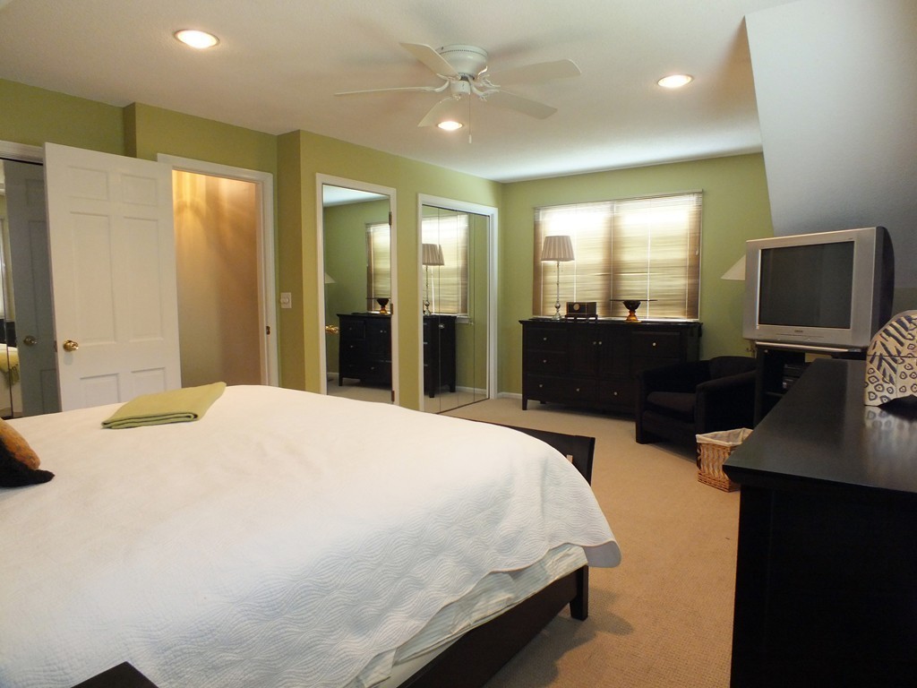 17 Orchard Road East Longmeadow, MA 01028 - Photo 18 of 30 a bedroom with a bed and wooden floor