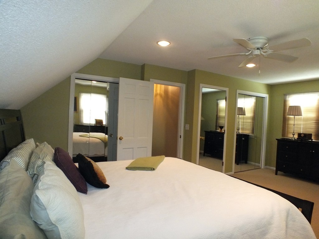 17 Orchard Road East Longmeadow, MA 01028 - Photo 19 of 30 a bedroom with a large bed and a large mirror