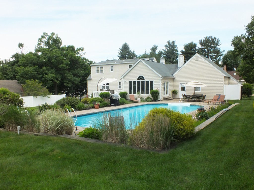 17 Orchard Road East Longmeadow, MA 01028 - Photo 2 of 30 a view of a house with a big yard and potted plants