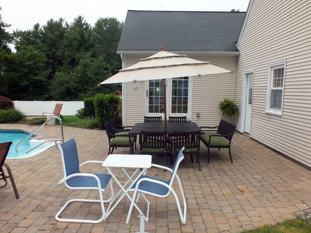 17 Orchard Road East Longmeadow, MA 01028 - Photo 28 of 30 a patio with a table and chairs
