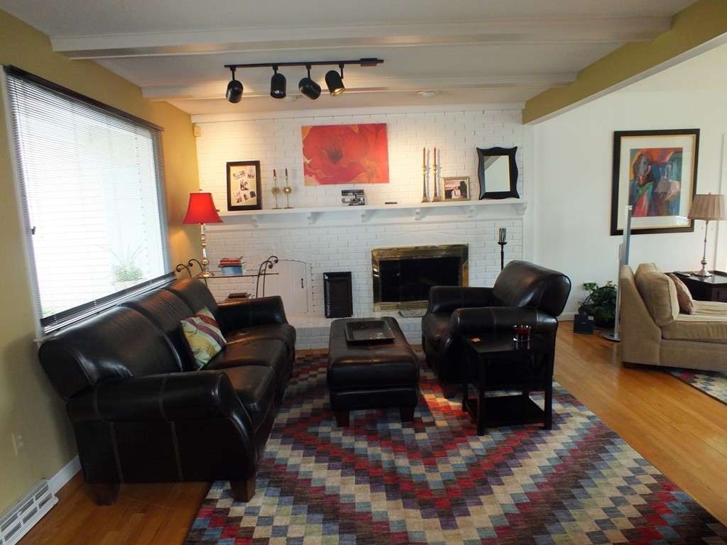 17 Orchard Road East Longmeadow, MA 01028 - Photo 9 of 30 a living room with furniture fireplace and a window