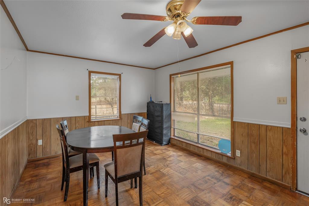 8321 Kingston Road Shreveport, LA 71108 - Photo 3 of 22 a view of a dining room with furniture window and outside view
