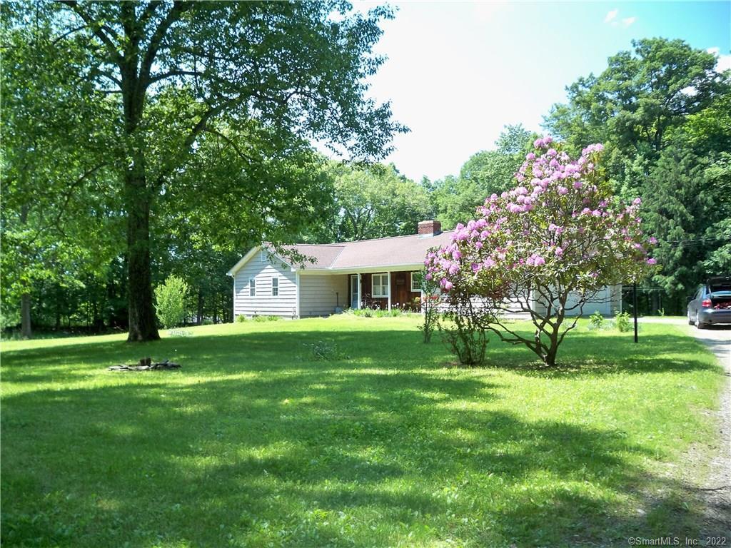 49 Legion Road New Milford, CT 06776 - Photo 1 of 1 a view of an house with backyard space and garden