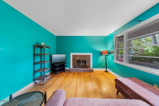 a bedroom with a bed and a table in it