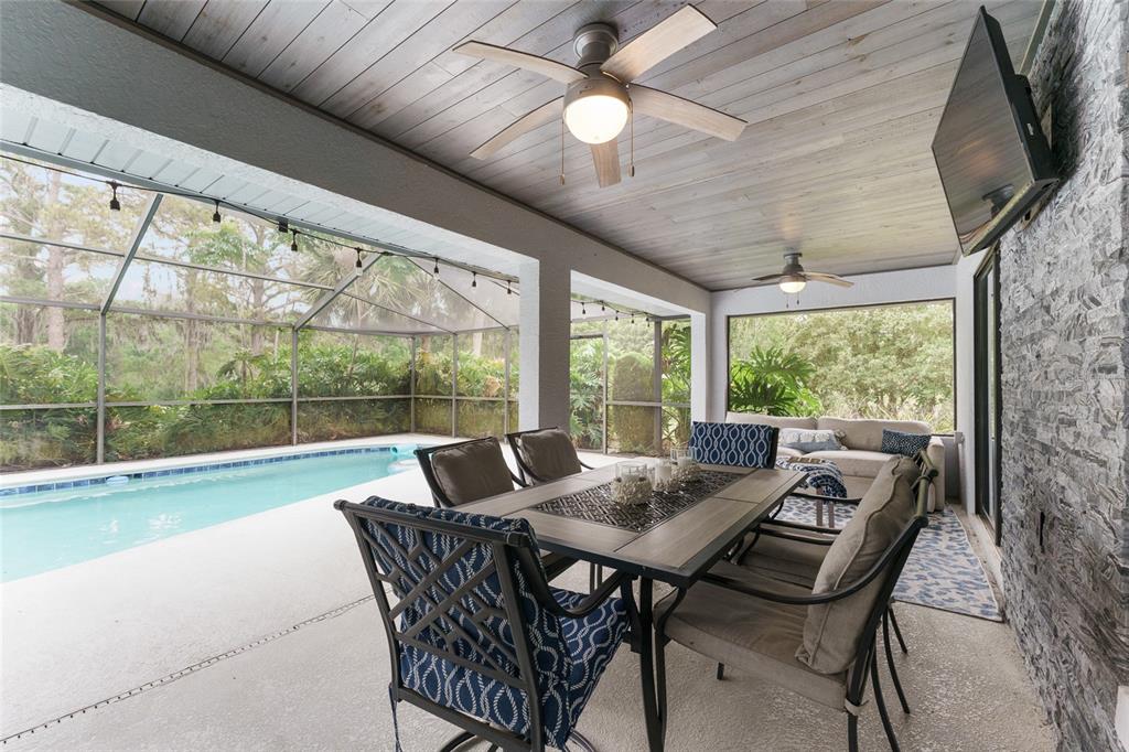 4841 Northwest 76th Court Ocala, FL 34482 - Photo 28 of 40 a view of a dining room with furniture window and outside view