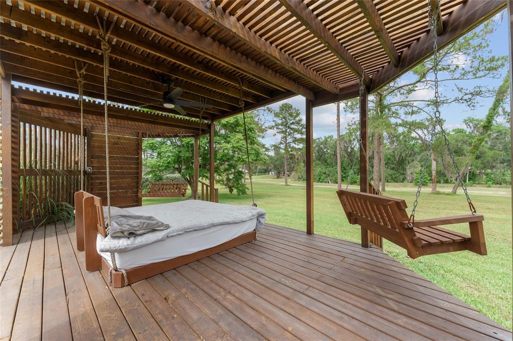 4841 Northwest 76th Court Ocala, FL 34482 - Photo 33 of 40 a patio view with a seating space