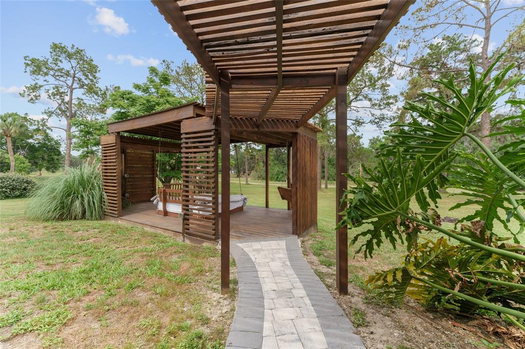 4841 Northwest 76th Court Ocala, FL 34482 - Photo 34 of 40 a view of a porch with a backyard