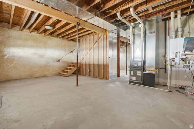20 Q Puma Road Fairview, UT 84629 - Photo 18 of 27 Spacious unfinished basement offering concrete flooring, exposed wood framing, and utility hookups