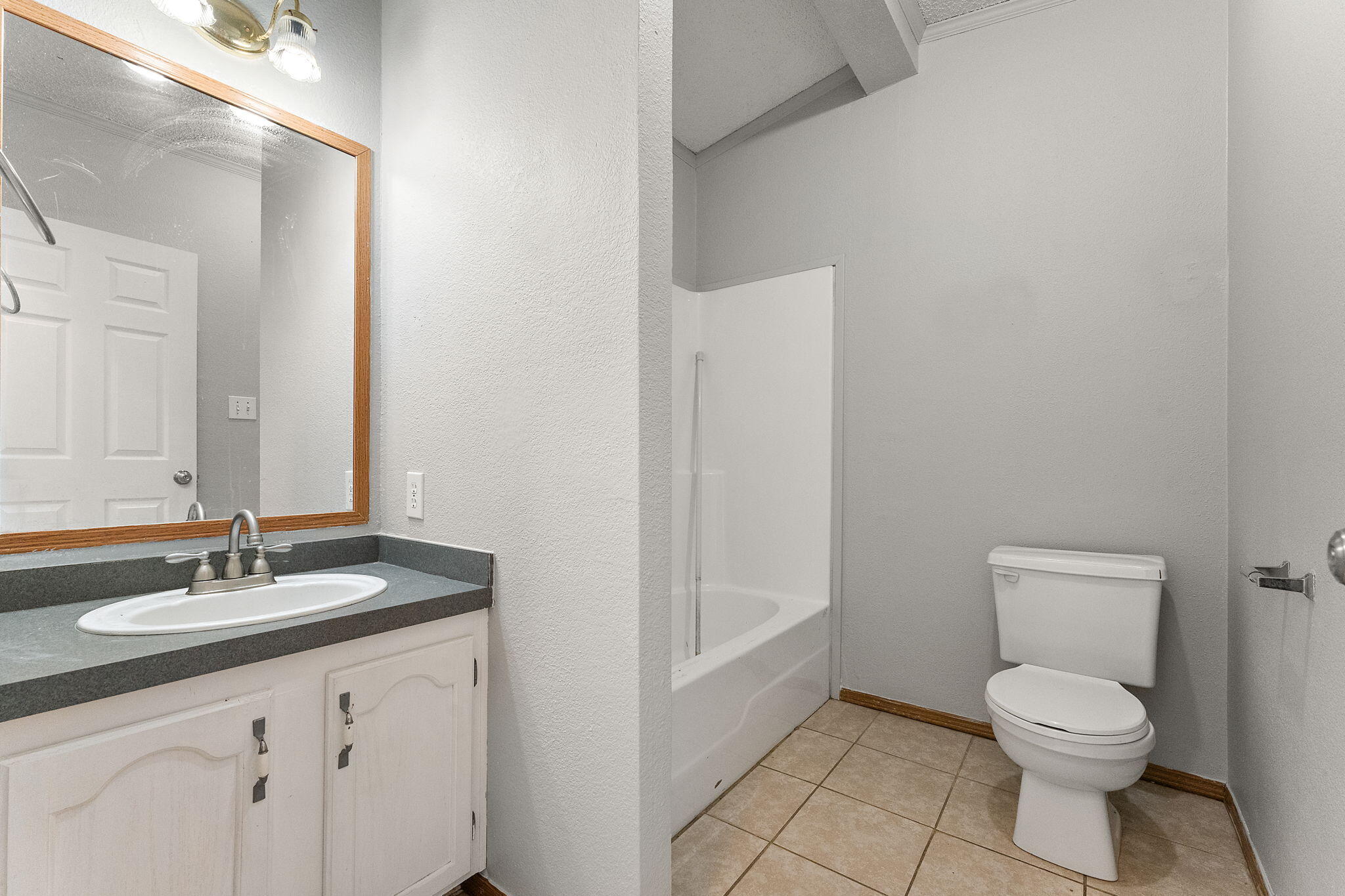 650 Freyer Road Michigan City, IN 46360 - Photo 42 of 49 a bathroom with a sink a toilet and a mirror