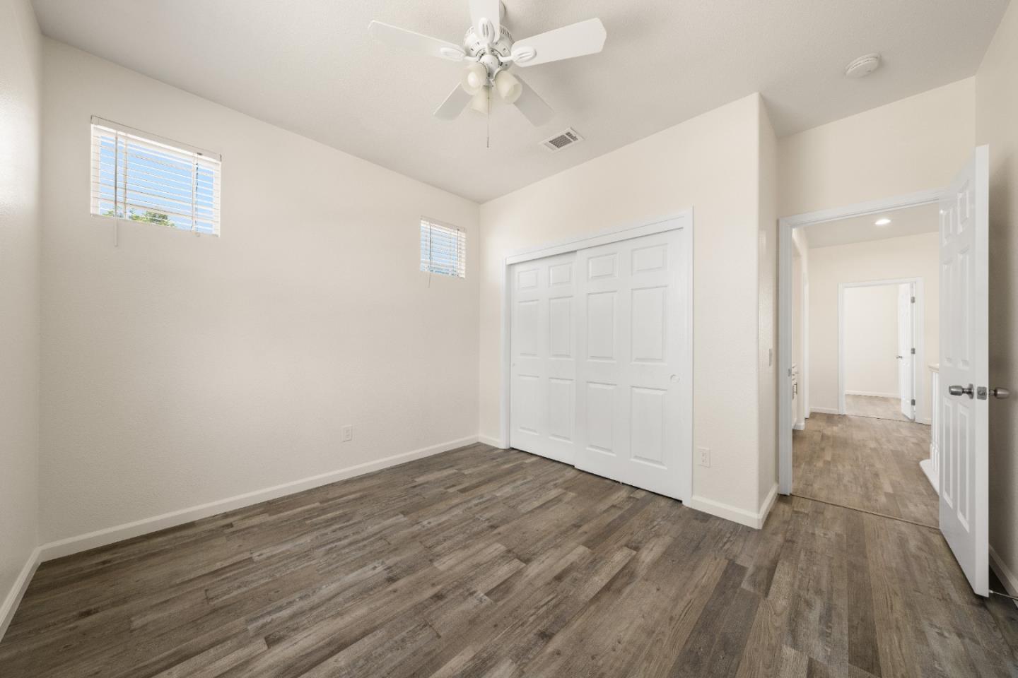 5700 Gold Poppy Way Elk Grove, CA 95757 - Photo 16 of 49 wooden floor in an empty room with a window