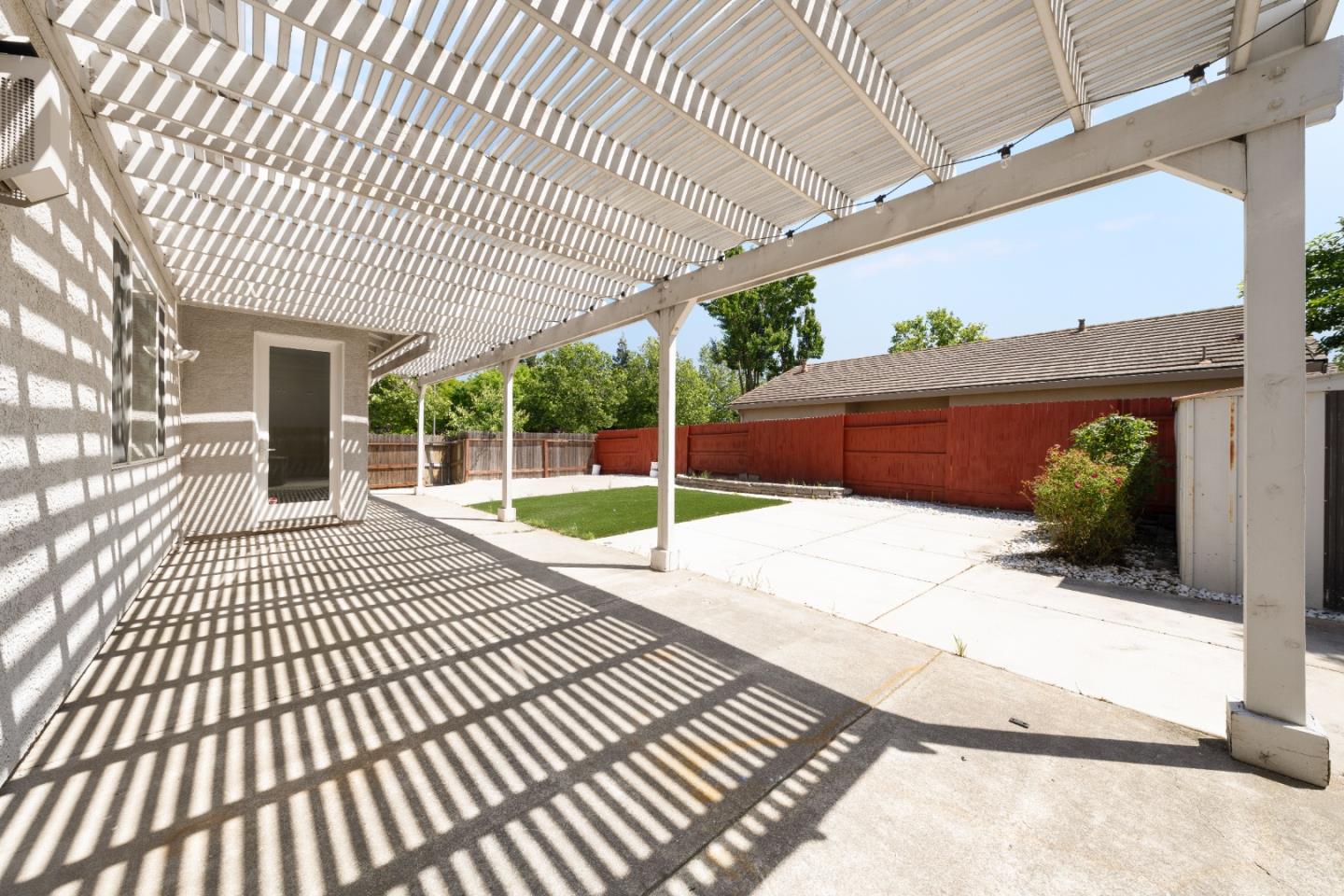 5700 Gold Poppy Way Elk Grove, CA 95757 - Photo 40 of 49 a view of a swimming pool with a porch