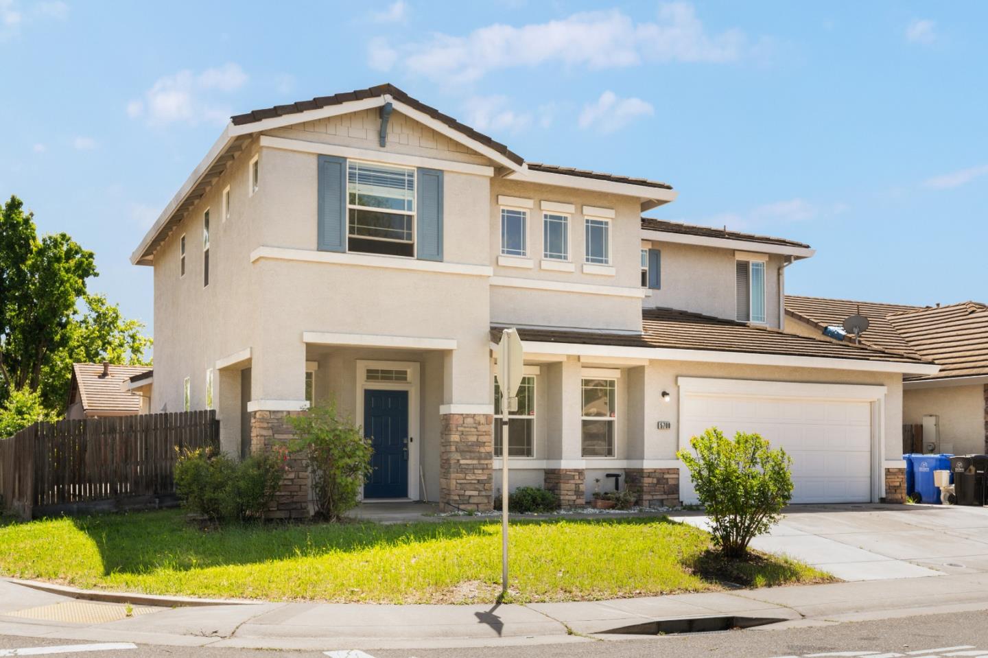 5700 Gold Poppy Way Elk Grove, CA 95757 - Photo 4 of 49 a view of a house with a swimming pool