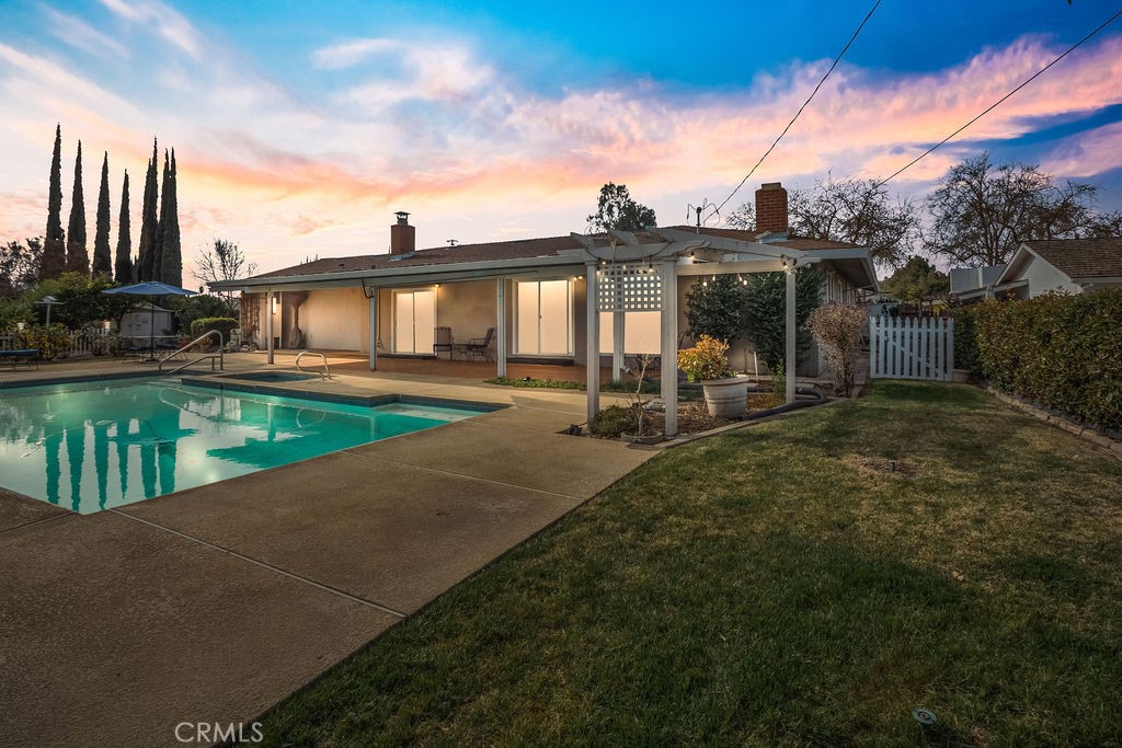 3046 El Capitan Avenue Merced, CA 95340 - Photo 13 of 18 a view of a house with backyard and sitting area