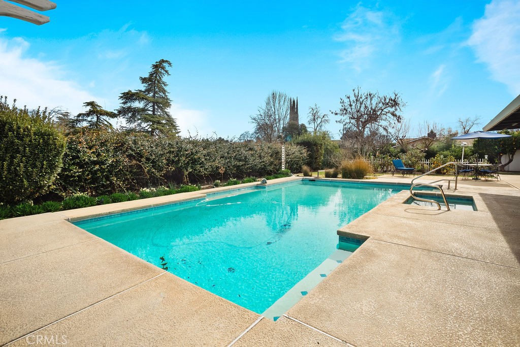 3046 El Capitan Avenue Merced, CA 95340 - Photo 14 of 18 a view of swimming pool with a yard