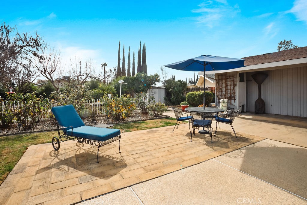 3046 El Capitan Avenue Merced, CA 95340 - Photo 17 of 18 a living room with furniture and a table