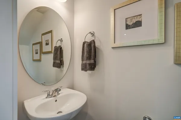 a kitchen with a sink and a refrigerator