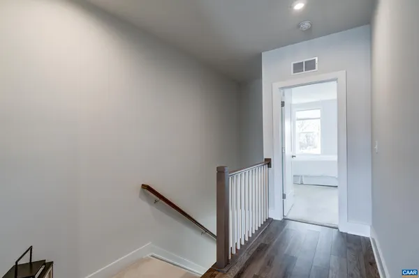 a view of a room with racks on the wall