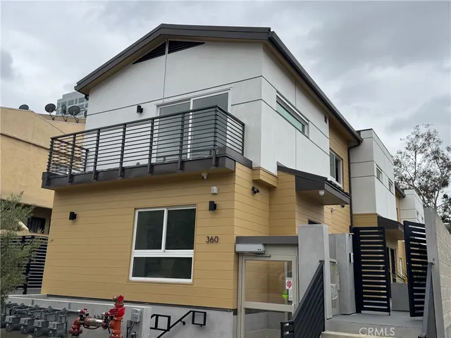 a front view of a house with garage