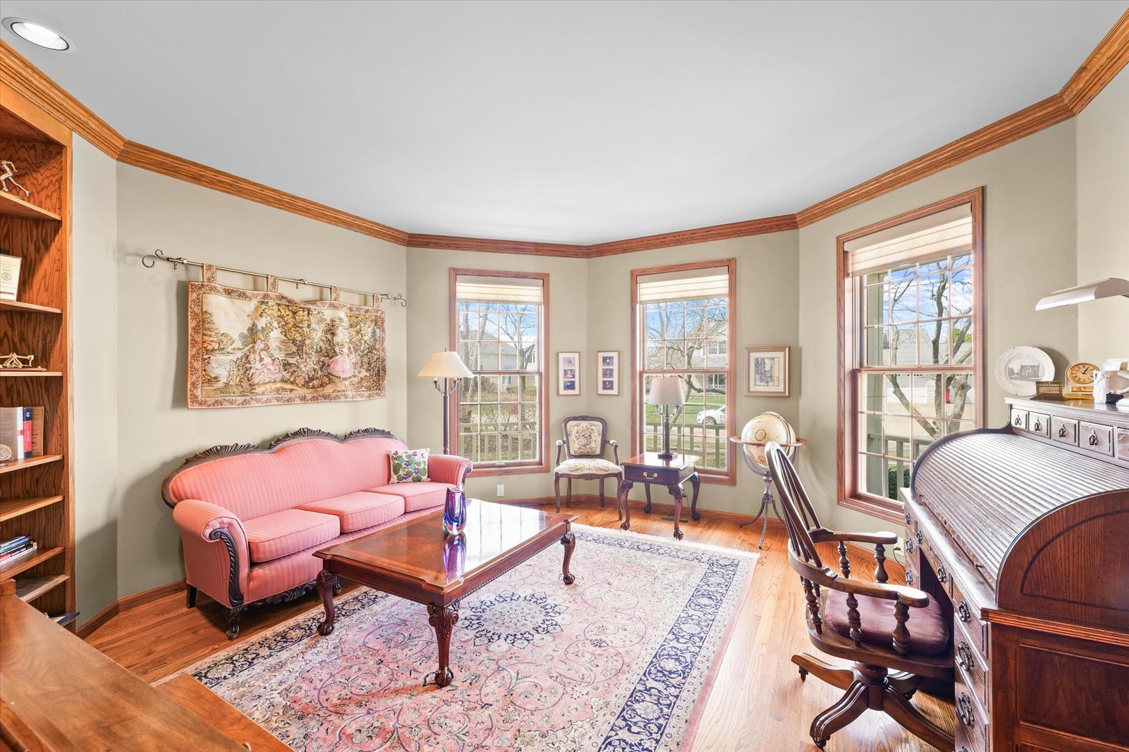 2204 Edgewater Place Champaign, IL 61822 - Photo 26 of 83 a living room with furniture large windows and wooden floor