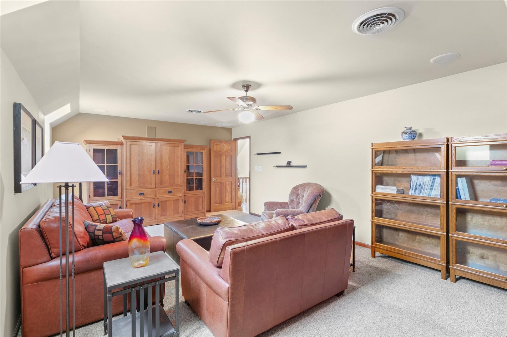 2204 Edgewater Place Champaign, IL 61822 - Photo 53 of 83 a living room with furniture and a chandelier