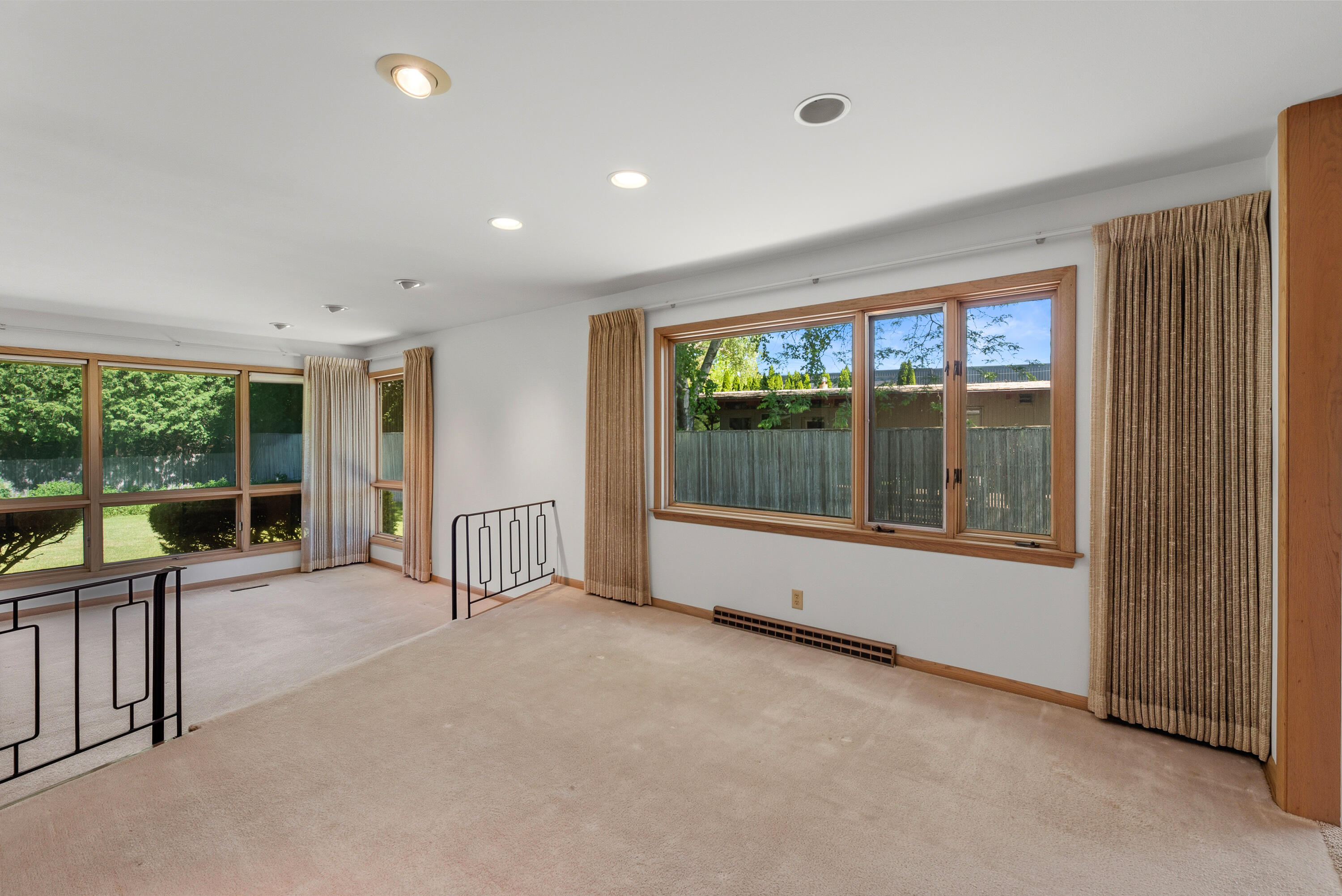 8909 North Maitland Road Bayside, WI 53217 - Photo 8 of 40 view from kitchen into dining room. walls of windows.