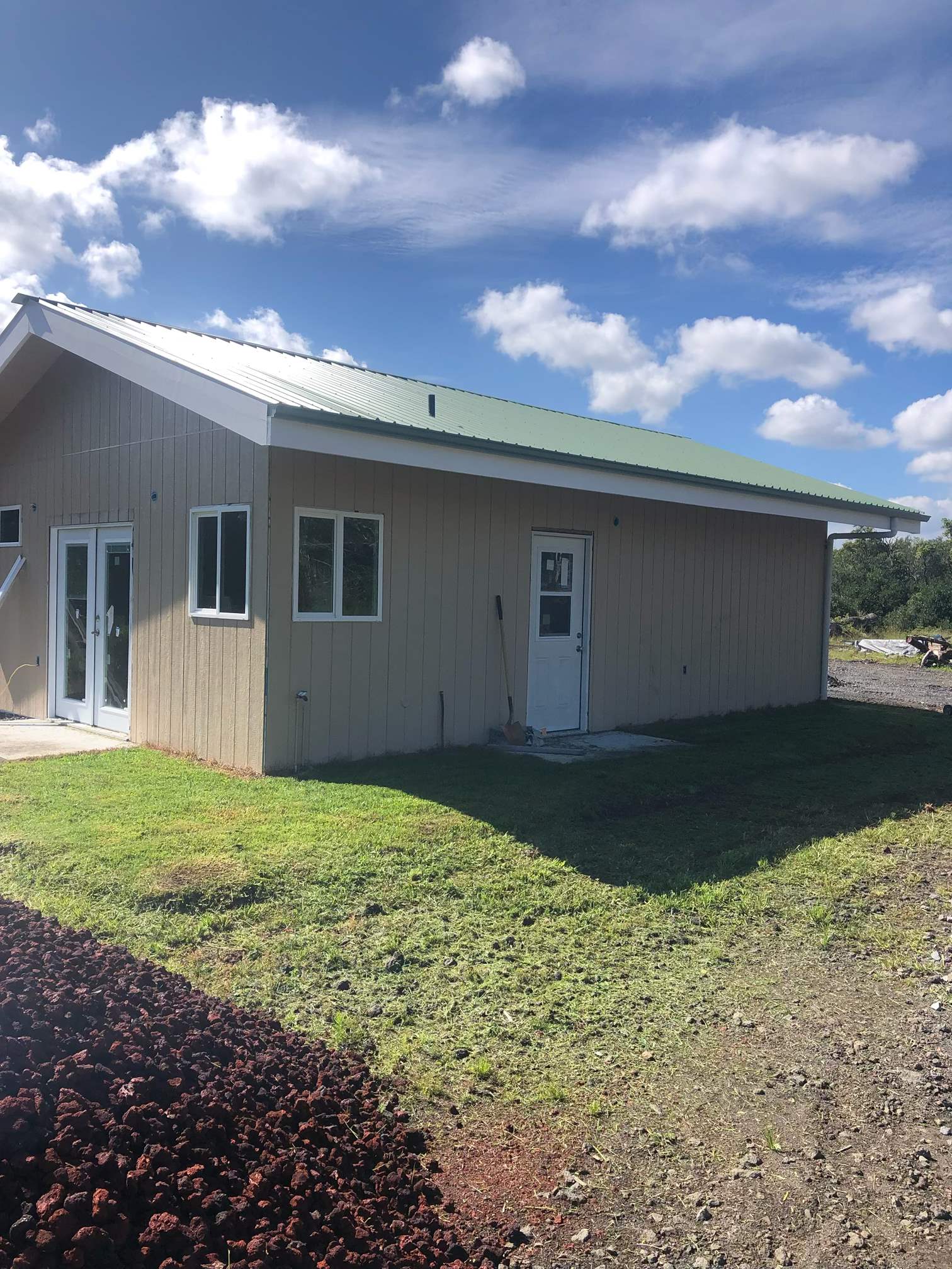 18-1309 Lot 10-d Ihope Rd Mountain View Mountain View, HI 96771 - Photo 2 of 17 a backyard of a house with lots of green space