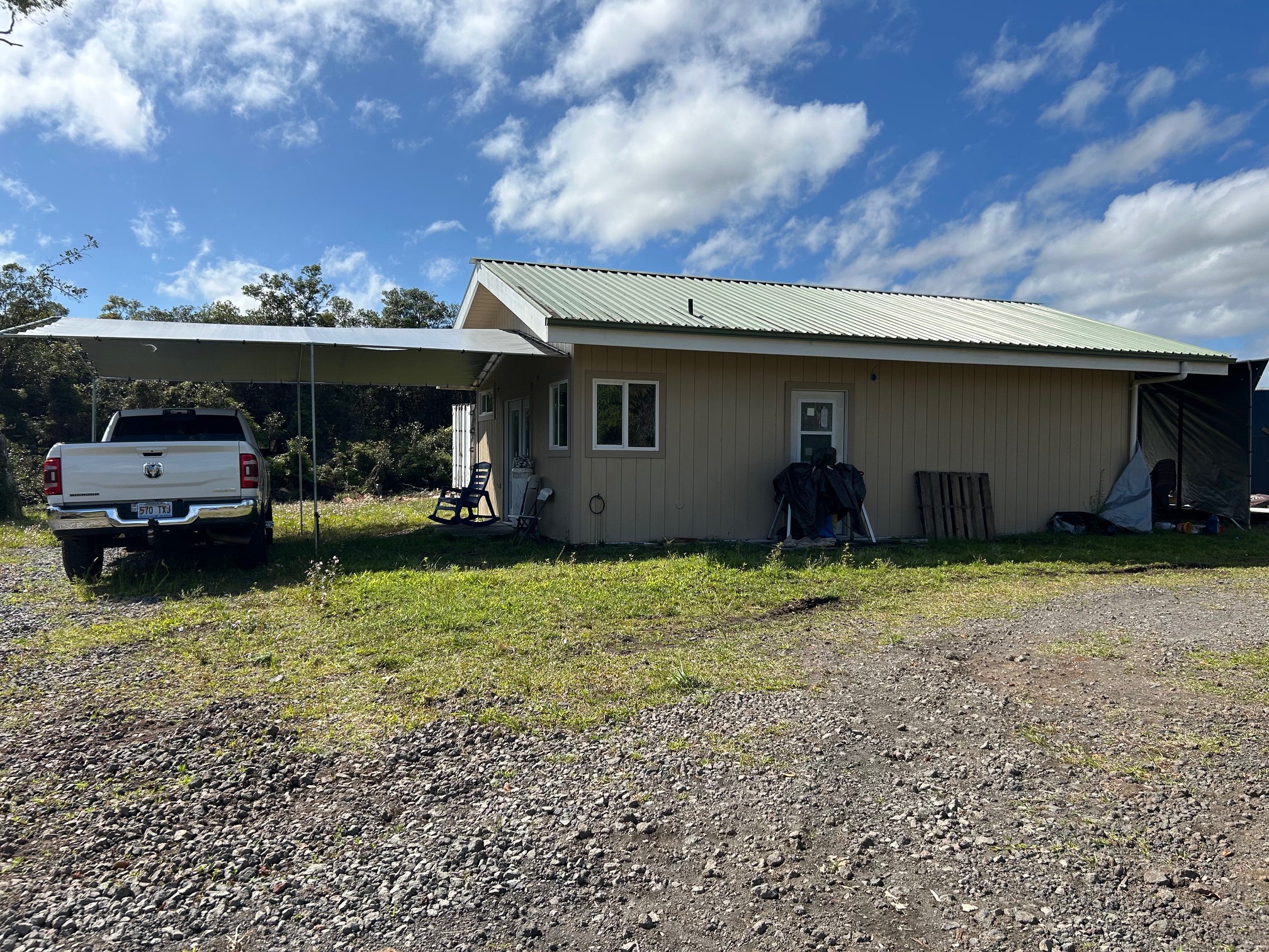 18-1309 Lot 10-d Ihope Rd Mountain View Mountain View, HI 96771 - Photo 3 of 17 a view of a house with backyard and porch