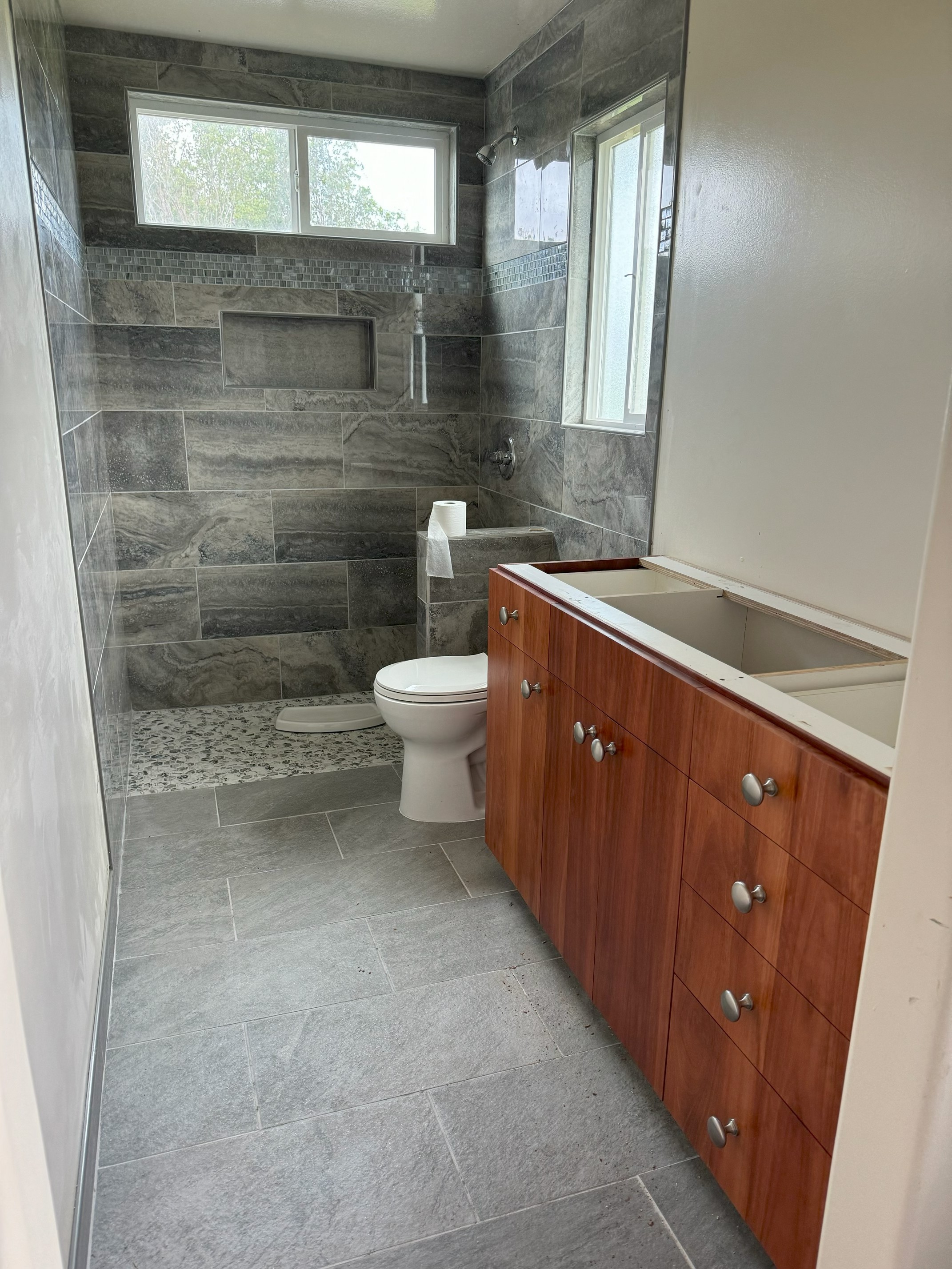18-1309 Lot 10-d Ihope Rd Mountain View Mountain View, HI 96771 - Photo 6 of 17 a bathroom with a sink and mirror