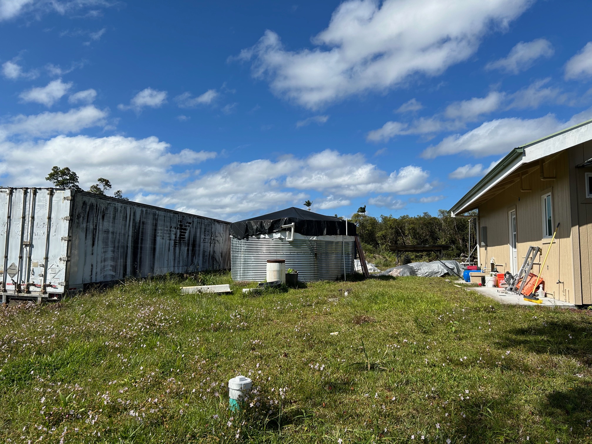 18-1309 Lot 10-d Ihope Rd Mountain View Mountain View, HI 96771 - Photo 8 of 17 a view of a house with backyard and sitting area