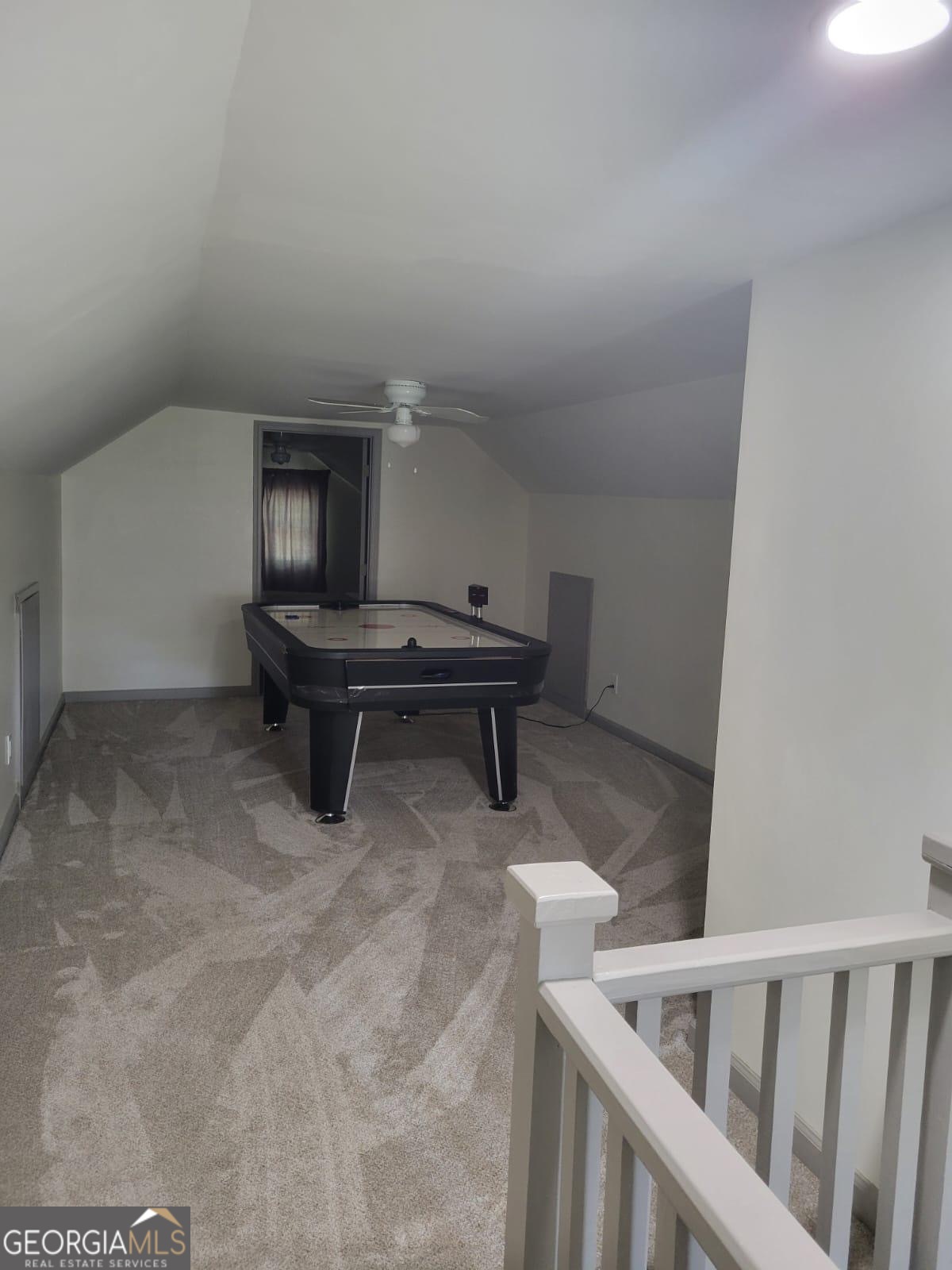 6127 Floyd Street Northeast Covington, GA 30014 - Photo 20 of 23 a room with a table and chairs