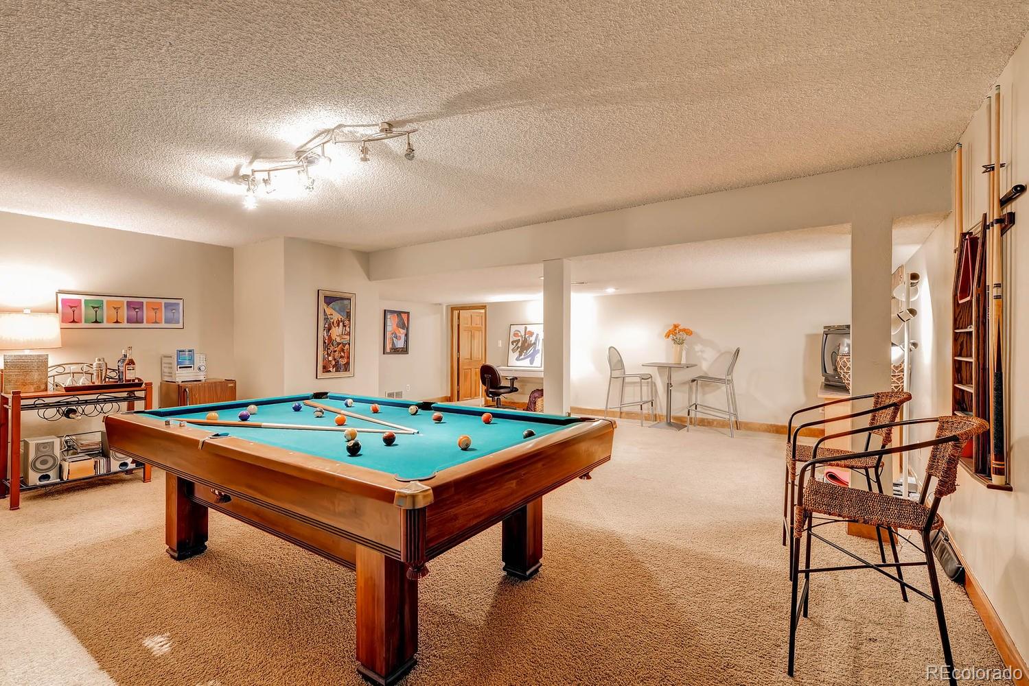 8110 Sweet Water Road Lone Tree, CO 80124 - Photo 24 of 34 a room with furniture and pool table