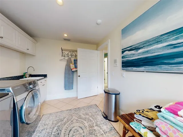 a living room with furniture fireplace and flat screen tv