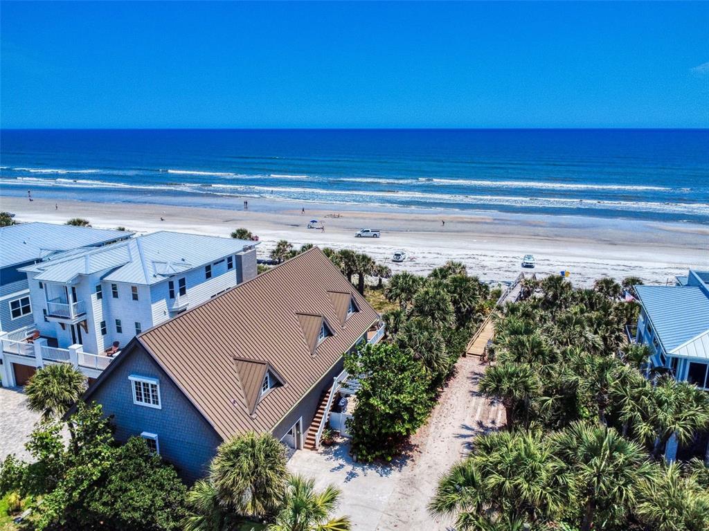 1913 Hill Street, Unit 2 New Smyrna Beach, FL 32169 - Photo 3 of 90 a view of a building in the backyard of a building