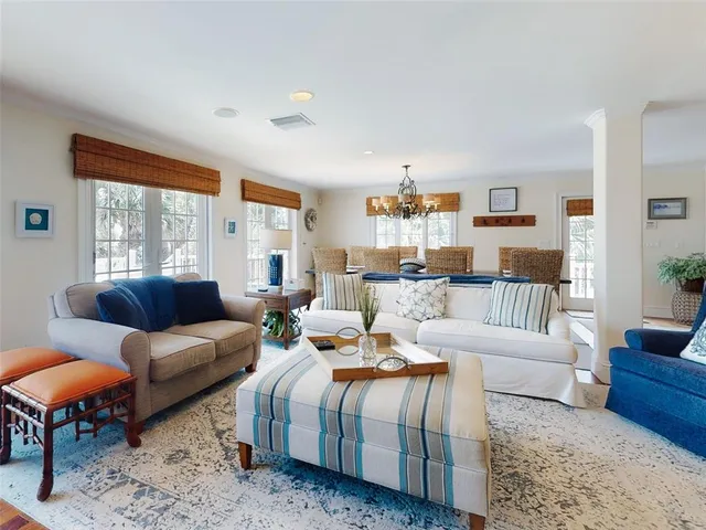 a spacious bathroom with a sink shower and mirror