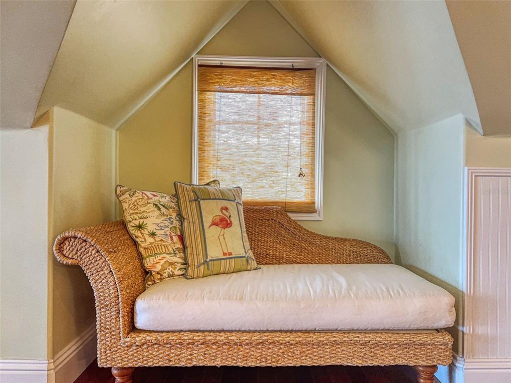 1913 Hill Street, Unit 2 New Smyrna Beach, FL 32169 - Photo 69 of 90 a bedroom with a bed and window