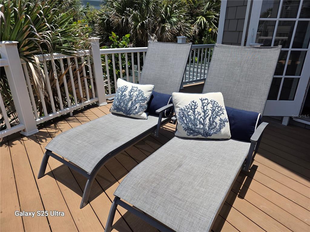1913 Hill Street, Unit 2 New Smyrna Beach, FL 32169 - Photo 89 of 90 a balcony view with a seating space
